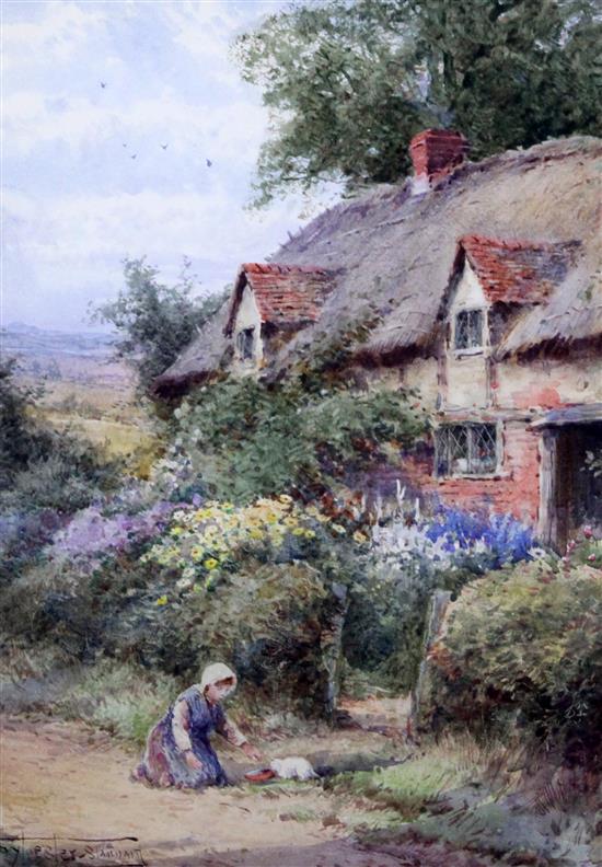 Henry Sylvester Stannard (1870-1951) Girl with a kitten beside a thatched cottage 13.75 x 9.75in.